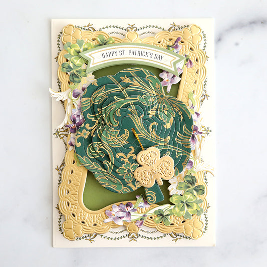 White card with charmed concentric layer and green damask shamrock