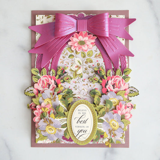 lavender floral card with dark pink frame, bow and floral stickers