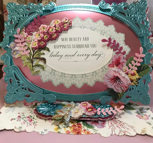 Pink and blue card with diecut sentiment and flowers