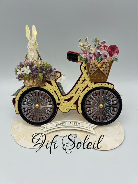 Card made with the new bicycle dies with a bunny in a basket.