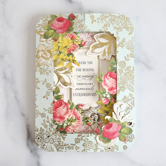 Blue tunnel card with pink and yellow flowers.