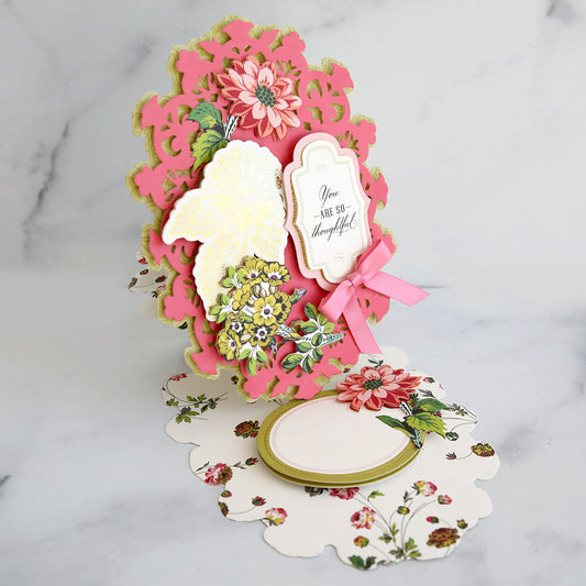 white, green and pink easel card with floral embellishments