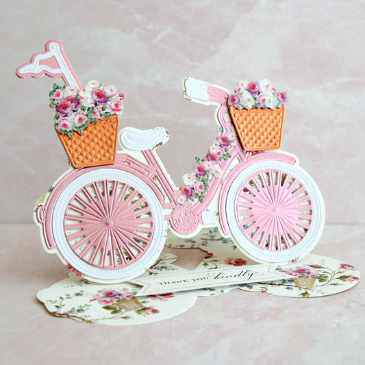 pink and white bicycle easel card with copper baskets