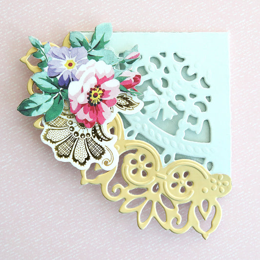 blue and gold corner bookmark with flowers