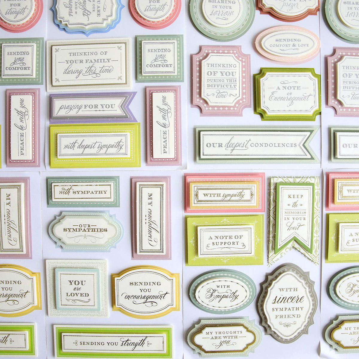 An assortment of sympathy and support greeting cards displayed in rows.