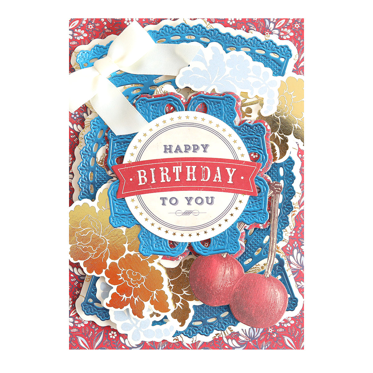 A decorative birthday card on Luxury Matte Foil Cardstock Dark Blue features layered blue, gold, and red designs, gold flowers, two cherries, a white ribbon, elegant embossing, and "Happy Birthday to You" in the center.