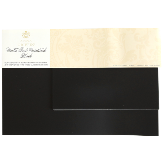 A pack of Luxury Matte Foil Cardstock Black, ideal for embossing or die cutting, features the label and a stack of sleek black cardstock sheets.