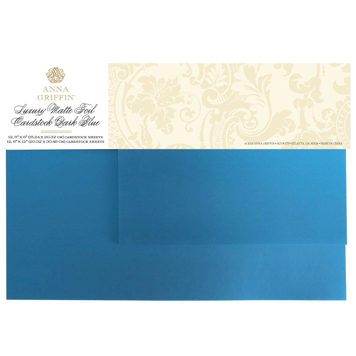 A package of Luxury Matte Foil Cardstock Dark Blue, ideal for embossing or diecutting, includes a decorative label and two sheets of elegant dark blue cardstock.