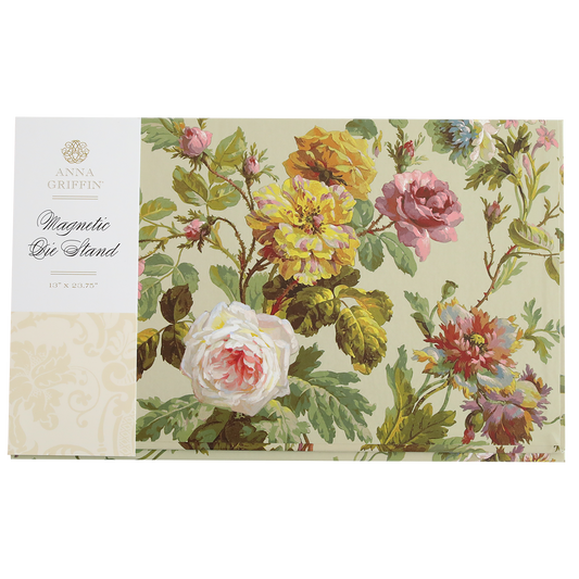 The Francesca Magnetic Die Stand features floral-patterned packaging with colorful flowers and green leaves on a cream background, making it ideal for keeping your craft room organized in style.