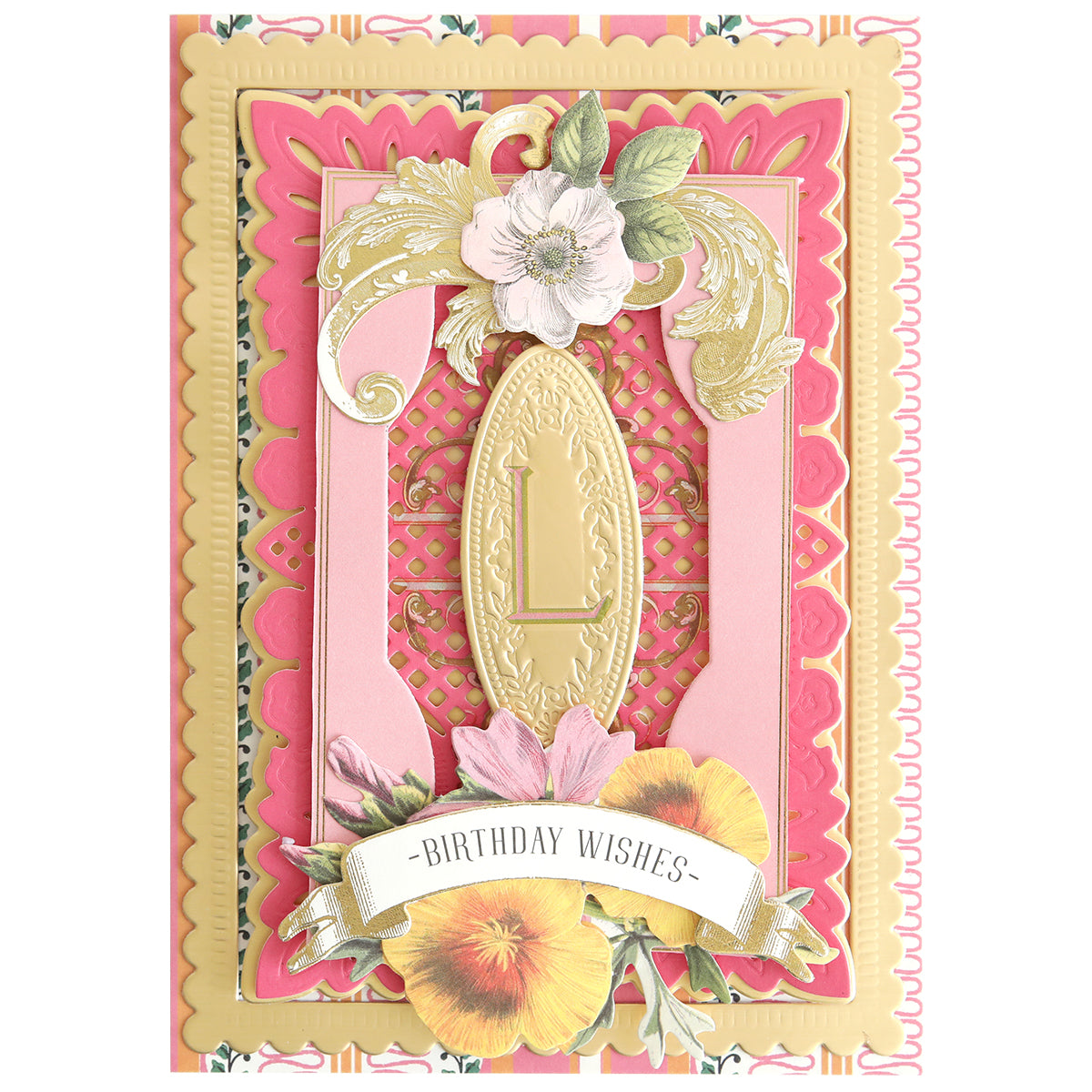 A decorative birthday card for cardmaking or scrapbooking, with pink, yellow, and gold layers, florals, an embossed "L" using Fancy Alphabet Rub On Transfers, and a "Birthday Wishes" banner.