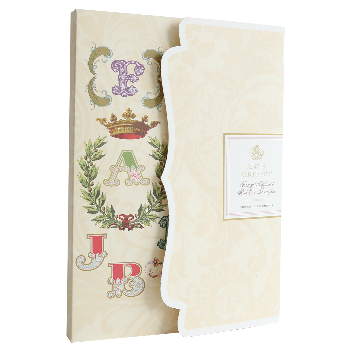 A decorative stationery set ideal for scrapbooking and cardmaking, featuring a cover with letters, crown, laurel motifs, and labeled "Fancy Alphabet Rub On Transfers.