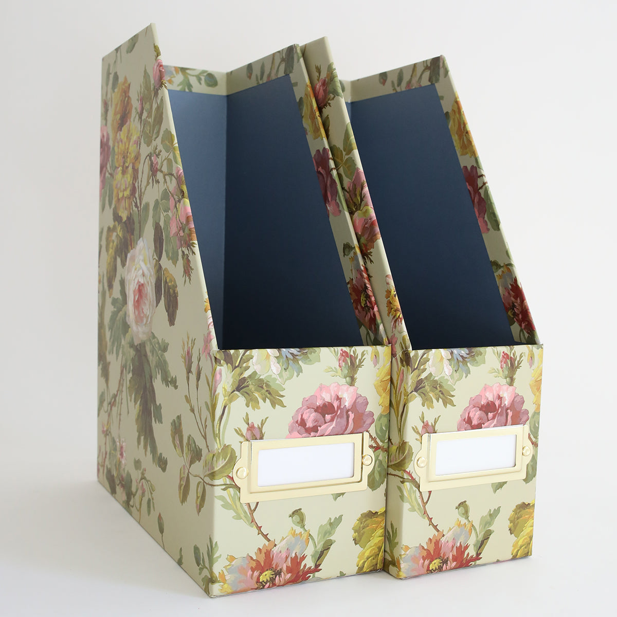 Two large die storage boxes from Francesca, featuring a floral pattern with blank label slots, stand side by side against a plain background.