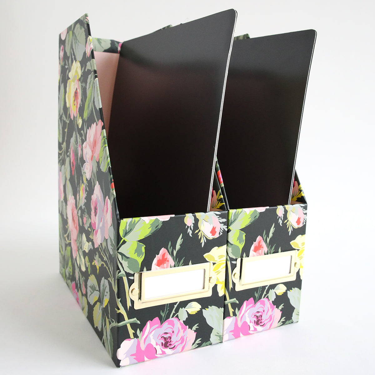 The Set of 2 Die Storage Boxes - Grace Black, featuring a floral pattern and label slots, are positioned side by side on a white surface—perfect for organizing your craft supplies.