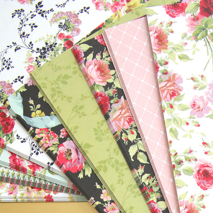 A stack of Garden Fountain Double Sided Cardstock layers with beautiful floral designs, perfect for paper crafting enthusiasts or fans of Garden Fountain.