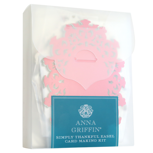 A craft package of the Simply Thankful Easel Card Making Kit featuring intricate pink paper designs for handmade cards.