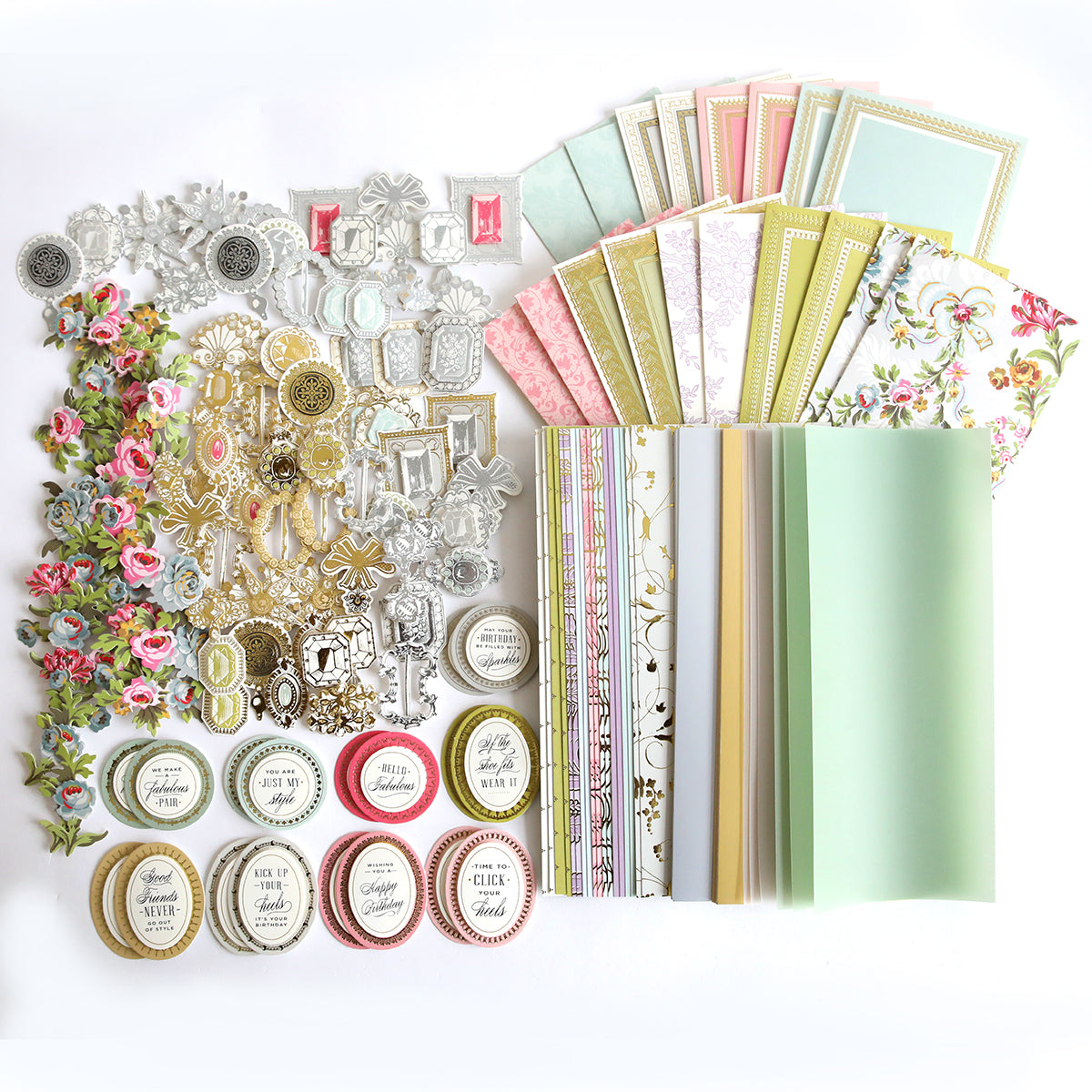 A collection of Paper Shoes Finishing School Refill Kit supplies, including cardstock and embellishments.
