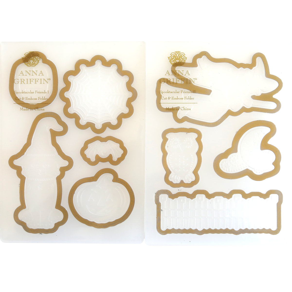 Two sets of Halloween-themed plastic molds and cut-and-emboss folders are on display, featuring shapes like a witch, hat, pumpkin, spider web, owl, moon, and fence. Each set is labeled "ANNA GRIFFIN" at the top and is named "Spooktacular Friends Cut and Emboss Folders." Perfect for creating a spooky scene or adding embellishments to your Halloween crafts.