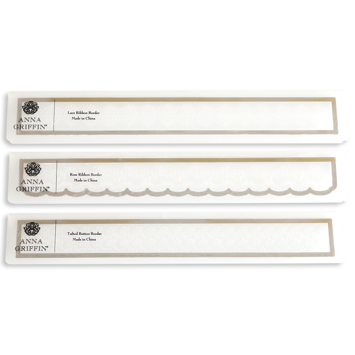 Three "Ribbon Border 12\" Cut and Emboss Folders" by Anna Griffin, each with a unique design, ideal for embellishing scrapbook pages. Made in China.