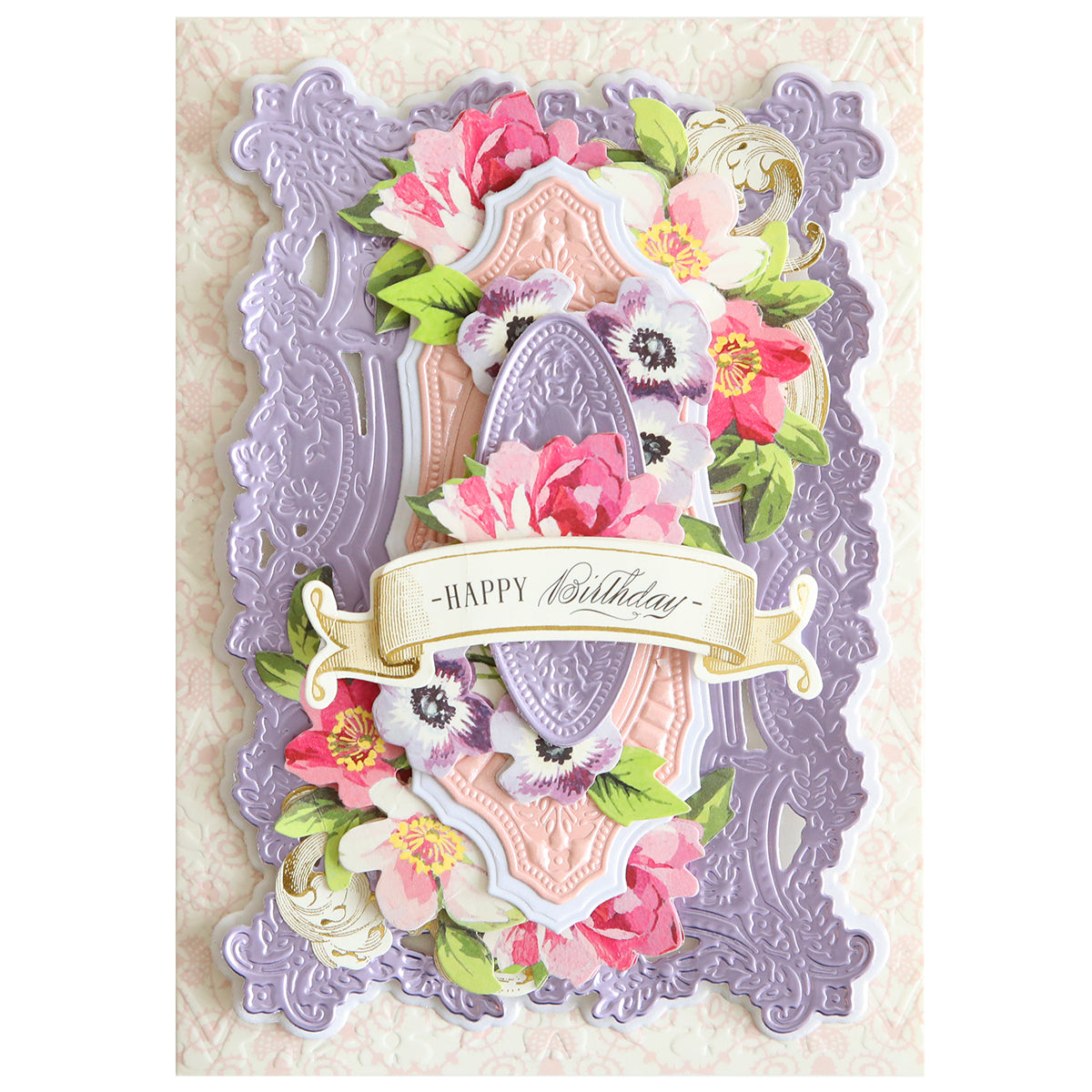 An ornate birthday card featuring the 3D Filigree Concentric Dies, enhanced with layered floral and lace designs in pink and purple hues, completed with a "Happy Birthday" banner at the center.