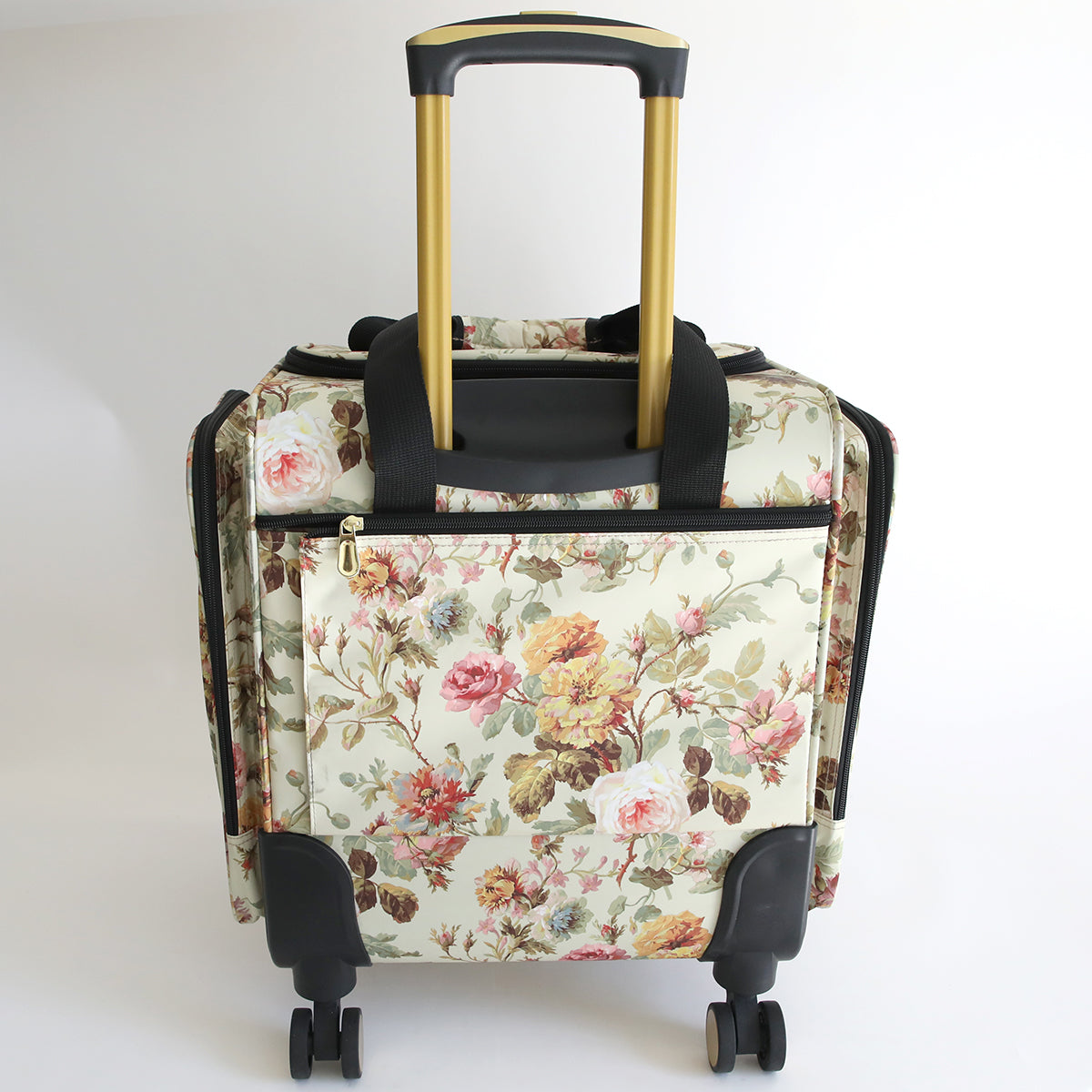 The Francesca Rolling Craft Luggage features a floral pattern, gold retractable handle, and black trim, shown standing upright against a plain white background.
