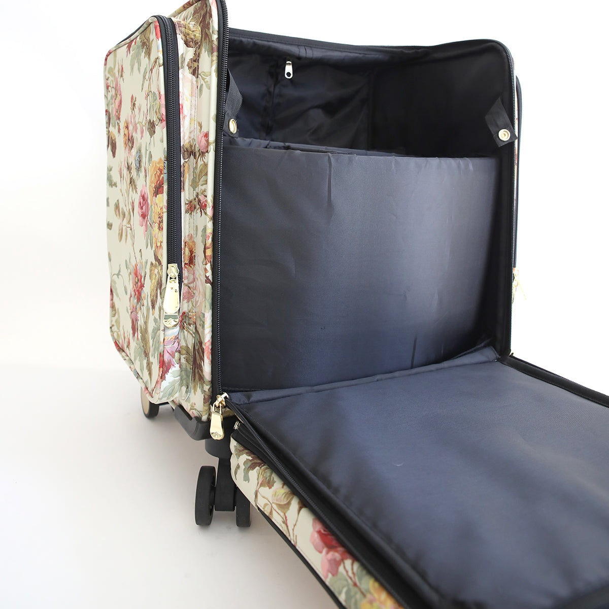 The Francesca Rolling Craft Luggage is shown open, displaying a floral-patterned exterior, spacious black interior, zippered compartment, and room for a detachable laptop briefcase.