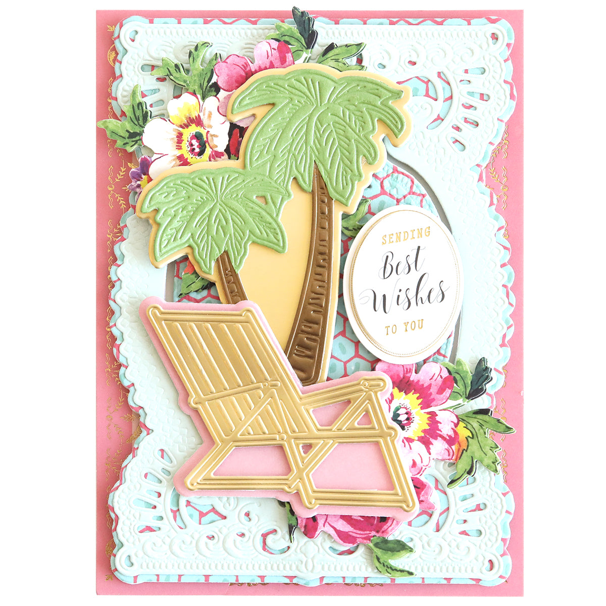 Decorative card showcasing palm trees, a pink-and-yellow lounge chair, and tropical oasis elements with a floral border. Features the message "Sending Best Wishes to You" and is ideal for scrapbook pages or using with the 3D Paradise Dies.