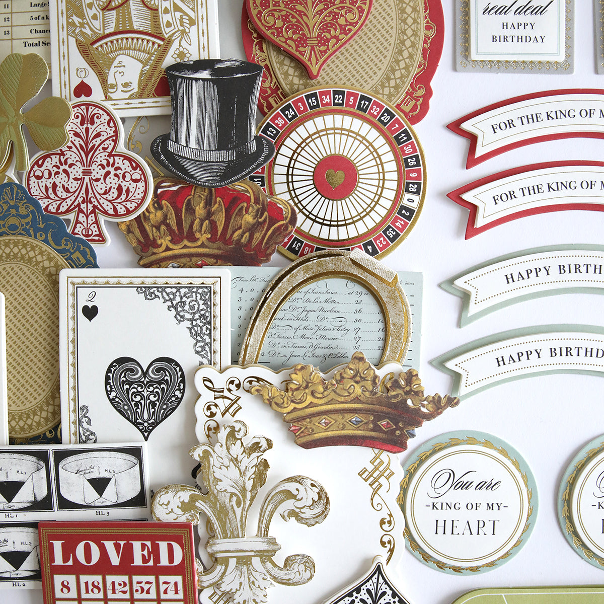 A collection of vintage-style paper cutouts featuring playing cards, crowns, and more—perfect 3D embellishments for your Simply King of My Heart Card Making Kit or to craft unique handmade cards.