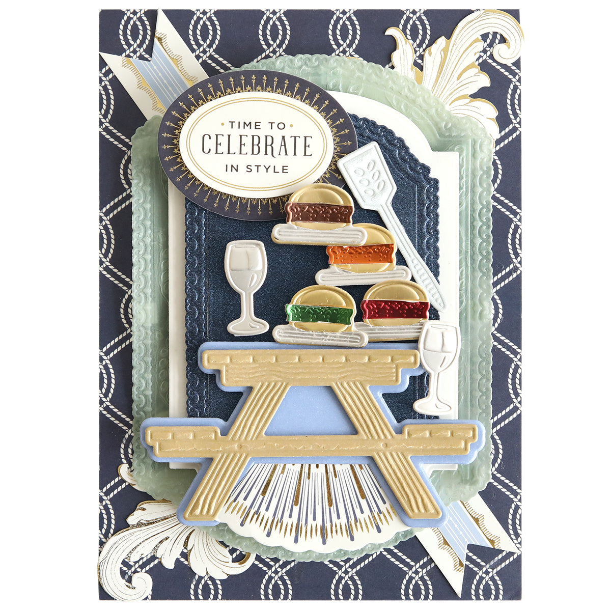 The 3D BBQ Scene Dies set is perfect for creating a festive picnic scene with food items, wine glasses, and a spatula. It features an ornate "Time to Celebrate in Style" sign, making it ideal for BBQ-themed handcrafted projects for crafting enthusiasts.