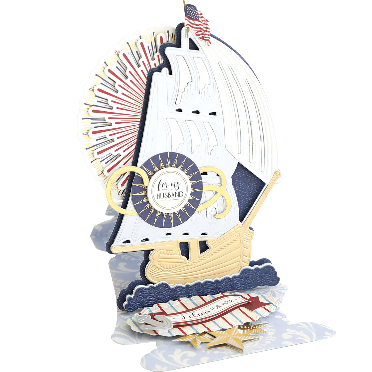 Pop-up card with a detailed sailboat and "For My Husband" message, set on a light blue patterned base reminiscent of Schooner Easel Dies, perfect for mariners at heart.