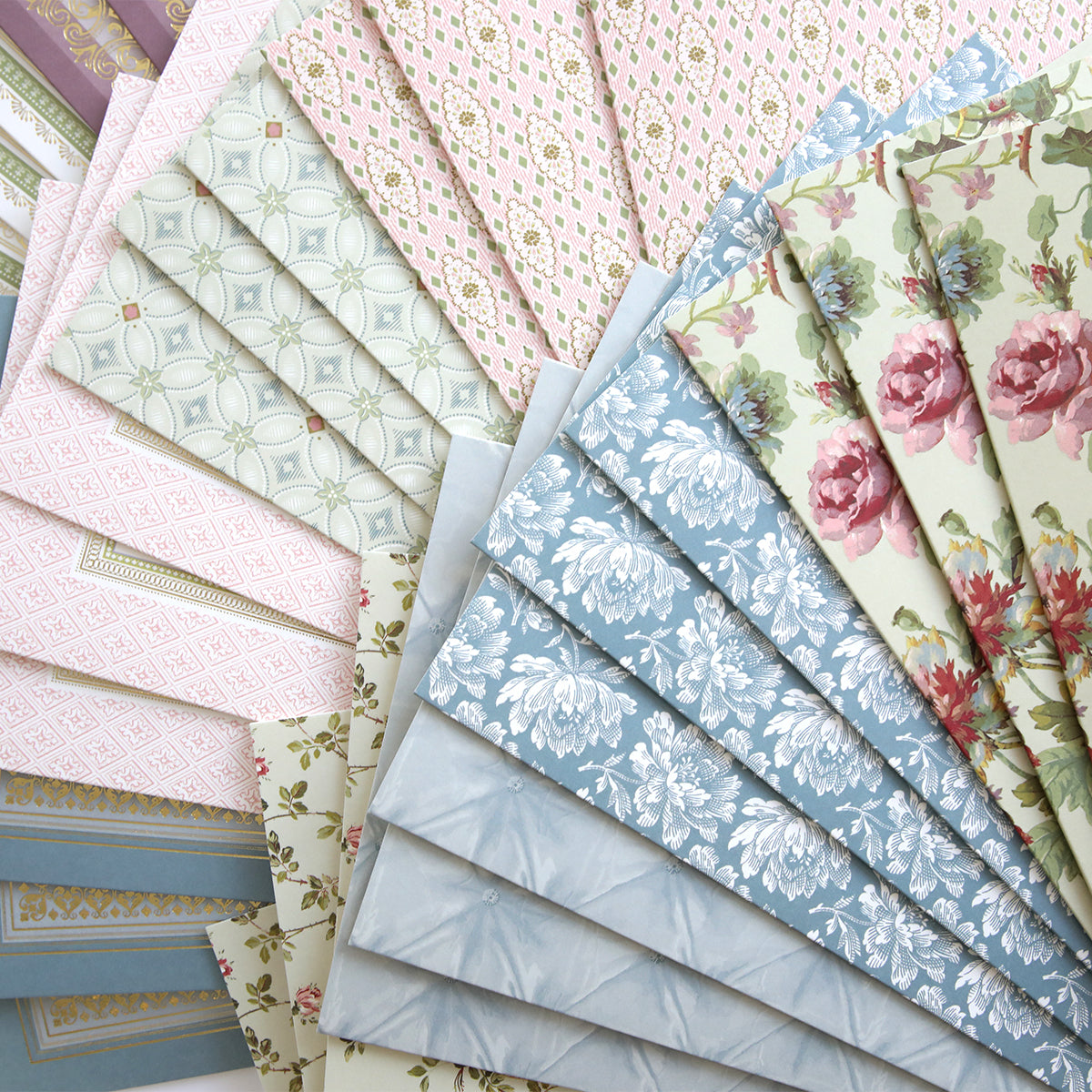 Francesca Cards and Envelopes feature pastel patterned sheets with floral, geometric, and decorative designs in pink, blue, green, and cream—perfect for crafting handmade cards.
