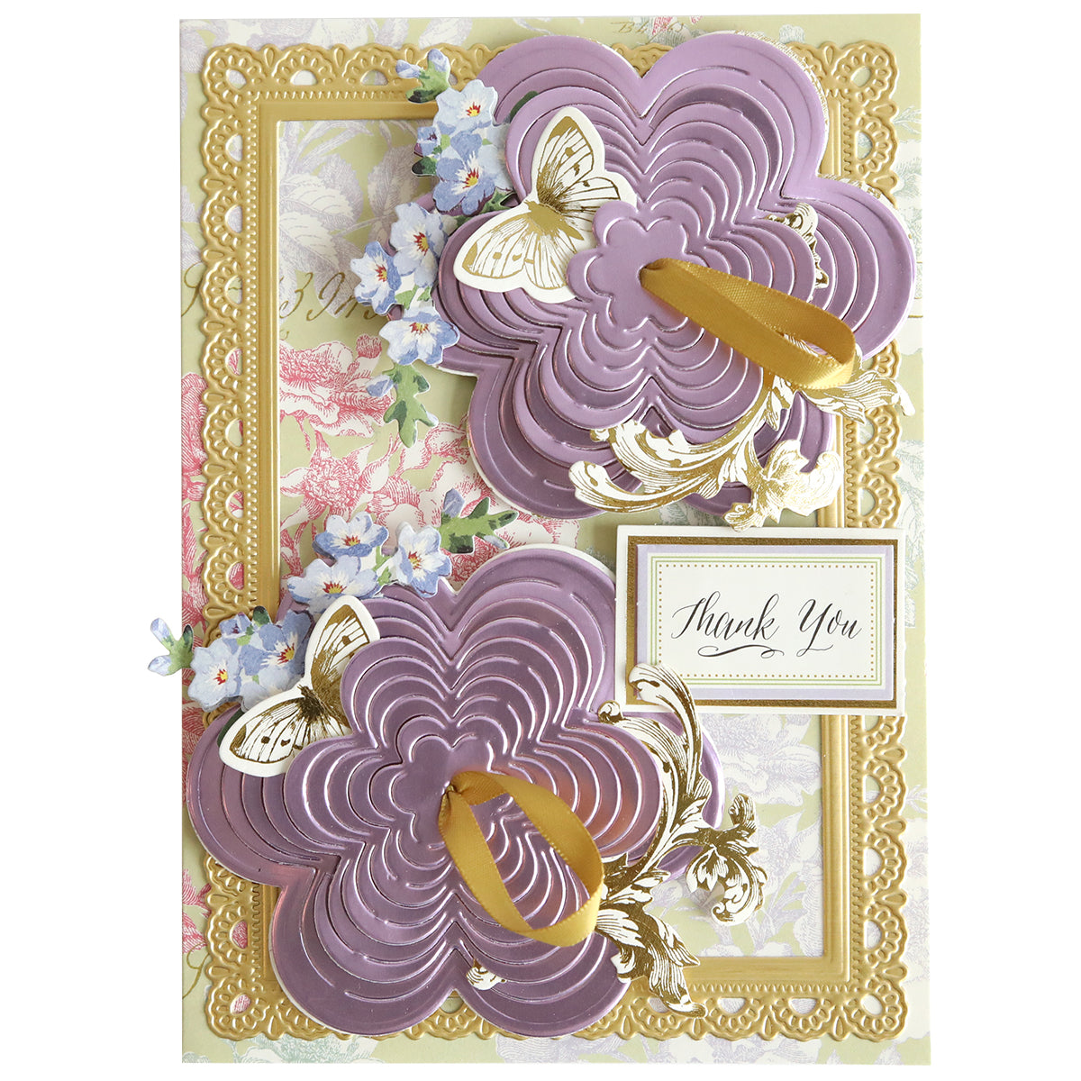 Create beautiful handmade cards with the Kirigami Butterfly Flower Dies—feature layered purple flowers, gold accents, butterflies, blue blossoms, and a "Thank You" message on a floral background. Perfect for decorative card making!.