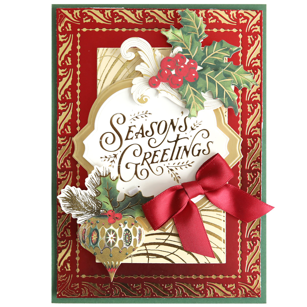 Share festive cheer with a handmade card created using the Gilded Christmas Frame and Sentiments Hot Foil Plate, featuring "Season's Greetings," holly, red berries, a red bow, and gold accents on a rich holiday background.
