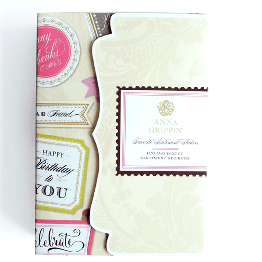 Box of Favorite Sentiment Stickers Everyday featuring ornate labels on ivory cardstock with sentiments like “Happy Birthday to You” and “Celebrate,” all organized in a stylish storage folio.