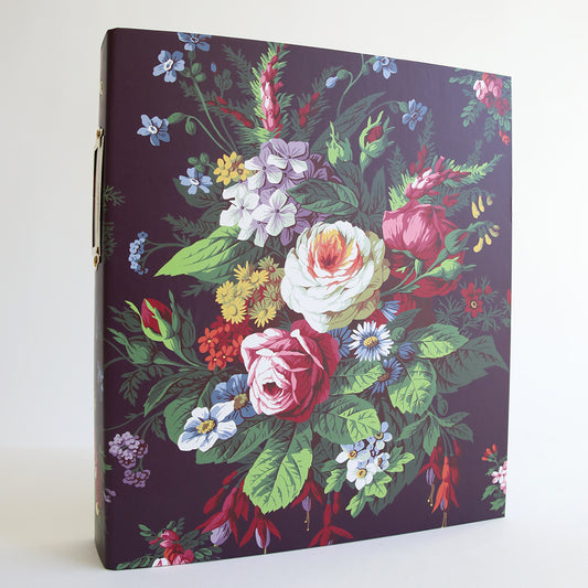 A Die Storage Binder - Astrid Floral with a floral pattern featuring large, colorful blooms and green foliage on a dark purple background, perfect for crafting organization.