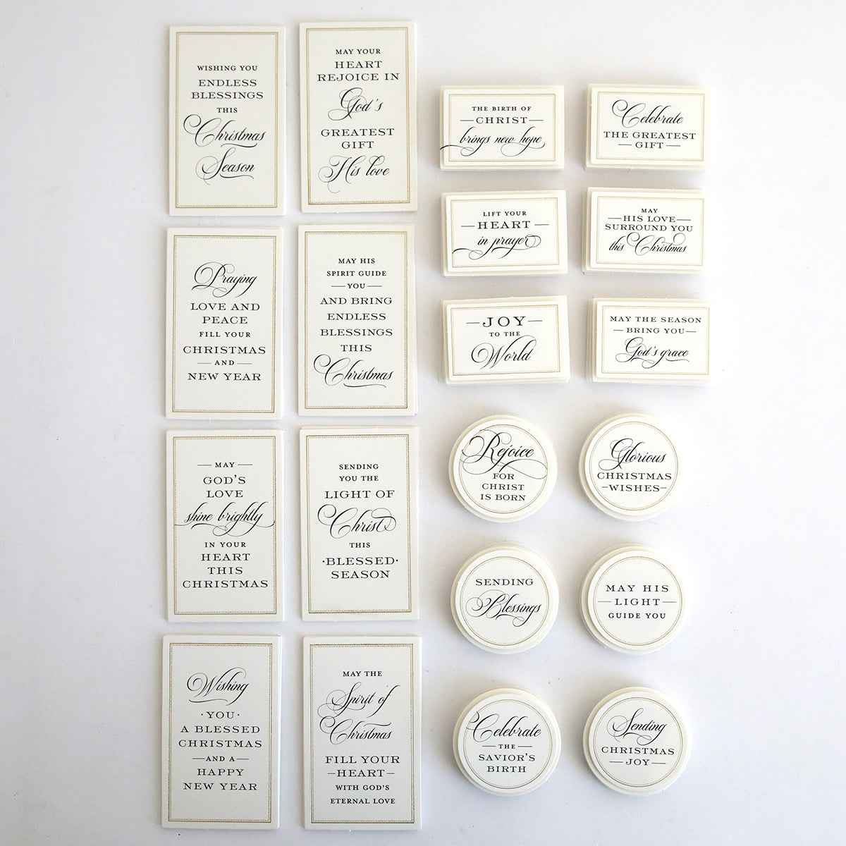 Christmas Blessings Sentiment Stickers: A set of rectangular and circular cards with holiday greetings and Christmas blessings in black text on white backgrounds.