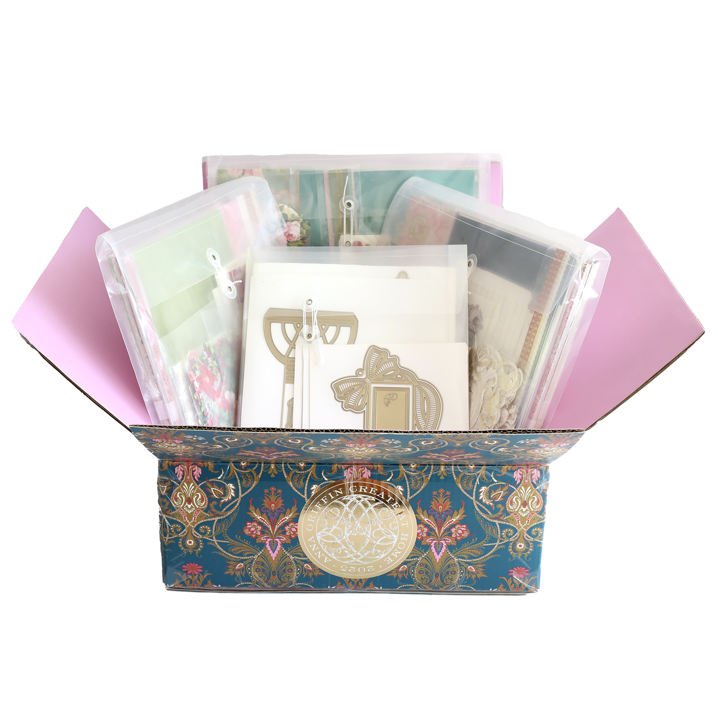 The Anna Griffin | Create 2025 Event Kit is a decorative floral box filled with envelopes, cards, and metal cutting dies in clear sleeves—perfectly organized for your next live streamed crafting session.