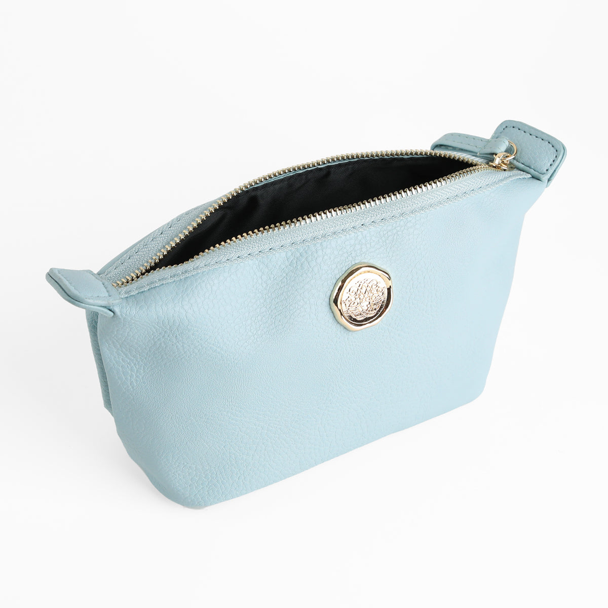 The Beach Glass Blue Small Cosmetic Bag is a light blue faux leather zippered pouch featuring a gold emblem on the front, displayed open to reveal its black interior lining against a white background—perfect as a stylish travel cosmetic pouch or small makeup bag.