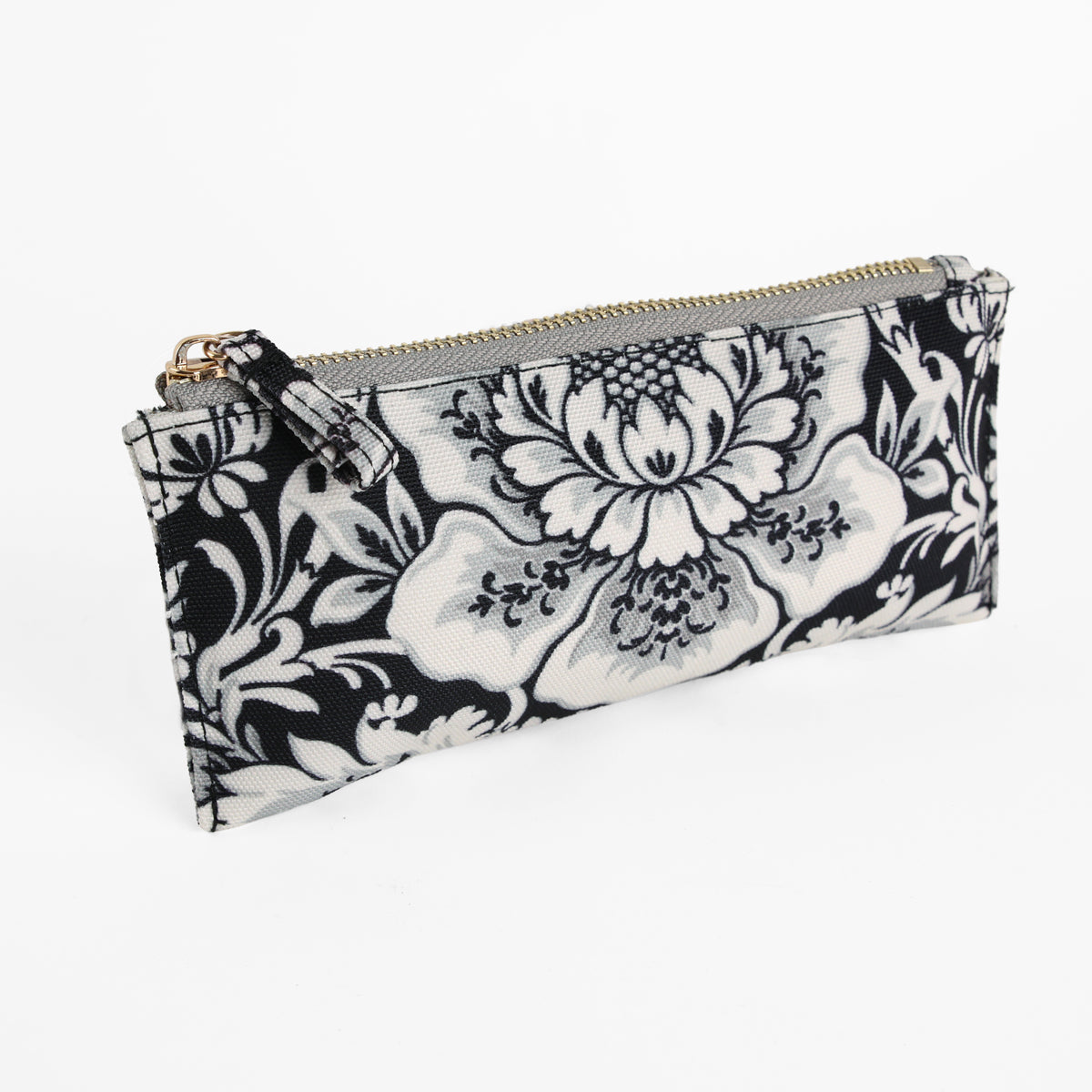 Damask Noire Pencil Case, a rectangular zippered pouch featuring a black and white damask floral pattern on fabric, displayed against a white background. This elegant pencil case effortlessly combines functionality with chic style, making it perfect for organizing your stationery.