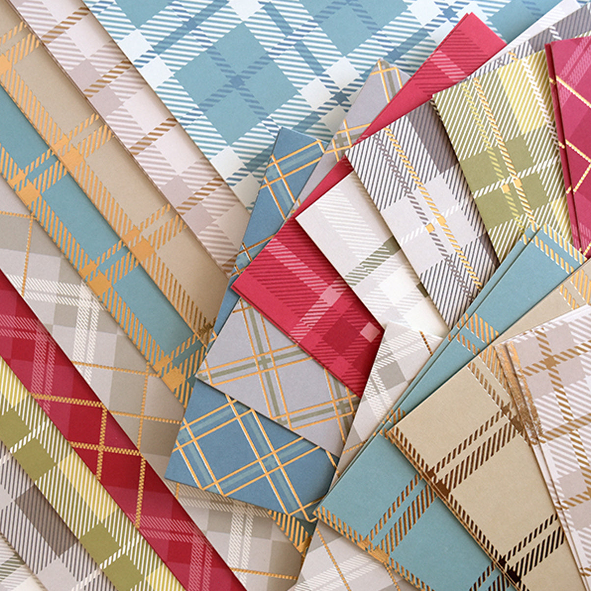 The Fall Plaid 5x7 and 12x12 Cardstock features a variety of layered, colorful plaid flannel patterns, making it ideal for capturing the essence of autumn trends.
