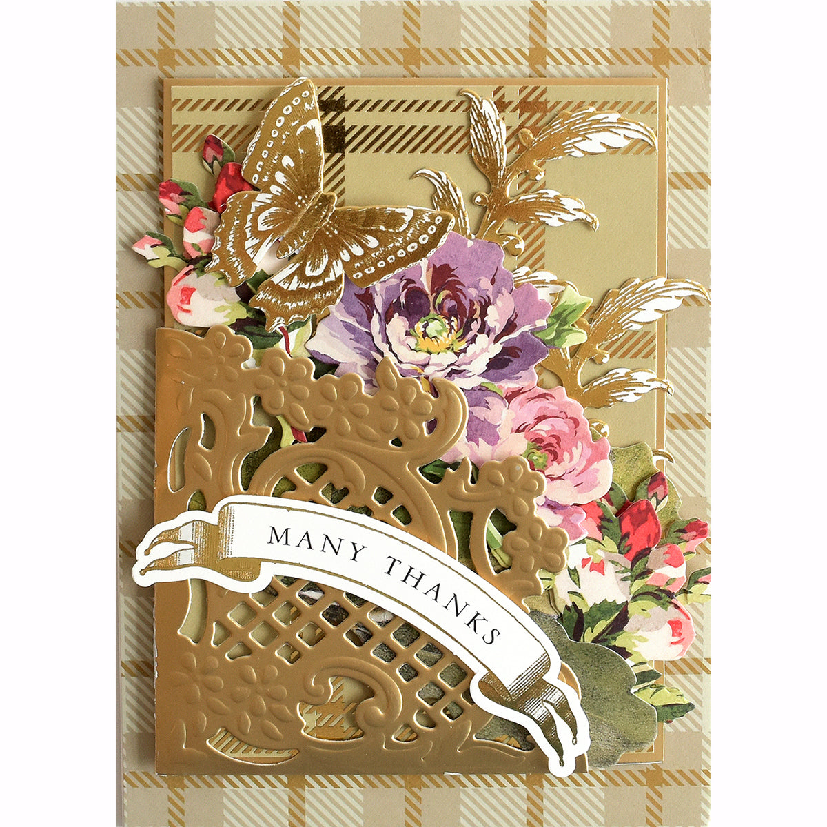 A decorative card showcasing the words "Many Thanks" on a banner is set against a backdrop crafted from Fall Plaid 5x7 and 12x12 Cardstock, featuring a floral and butterfly design.