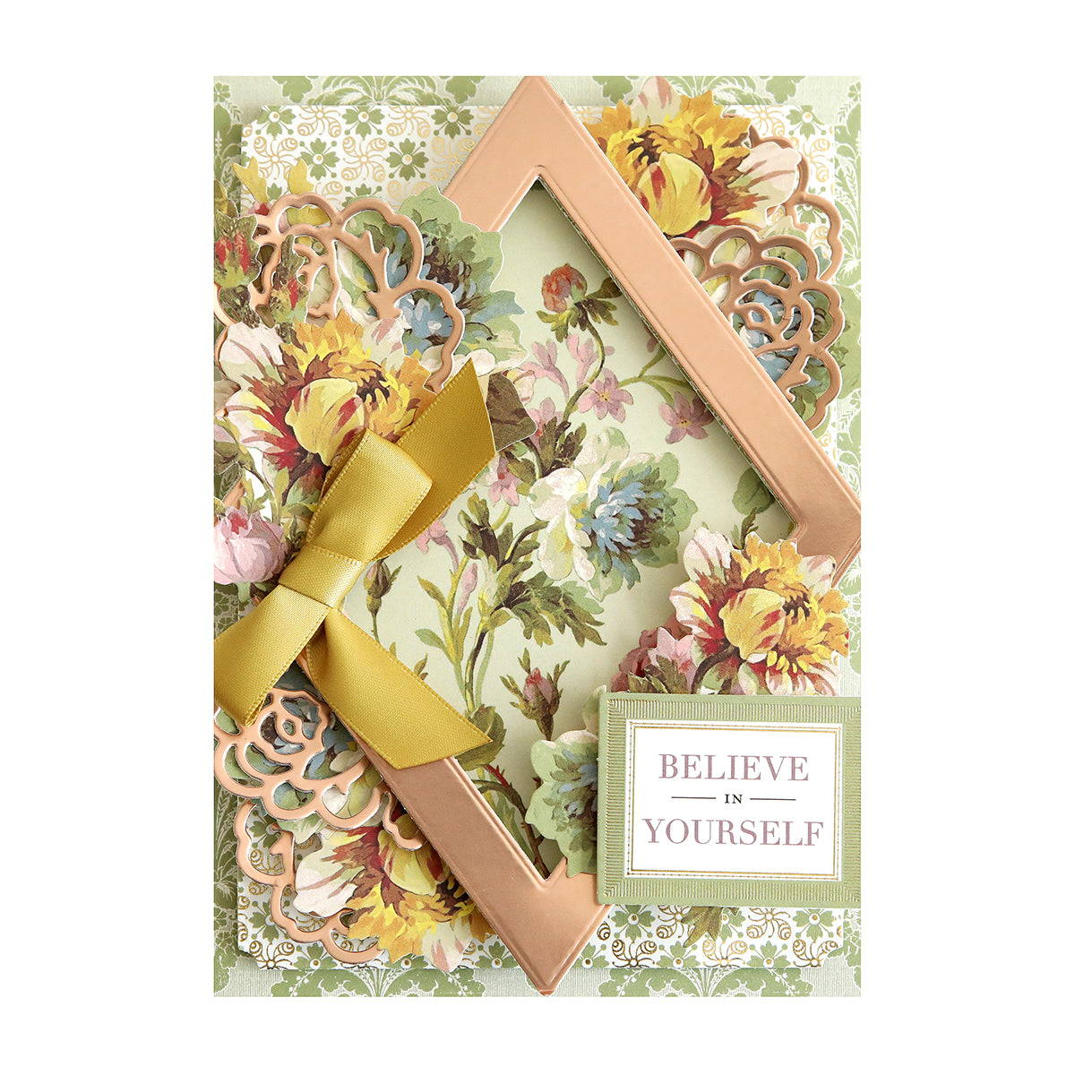 A floral greeting card with a gold frame, yellow ribbon bow, and a plaque reading "Believe in Yourself" on the bottom right.