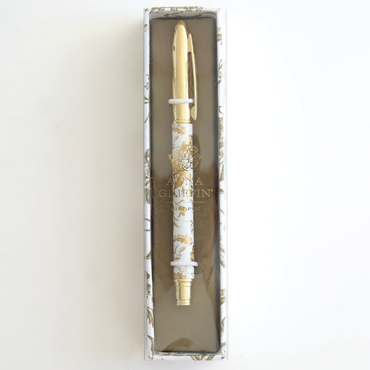 The Gold Climbing Rose Gift Pen, adorned with gold and white floral designs, is displayed in a rectangular box—ideal for any stationery enthusiast.