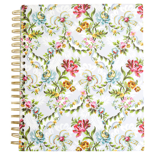 The Phoebe Floral Spiral Notebook showcases a vibrant floral pattern on its cover, beautifully enhanced with gold foil accents, combining elegance and practicality.