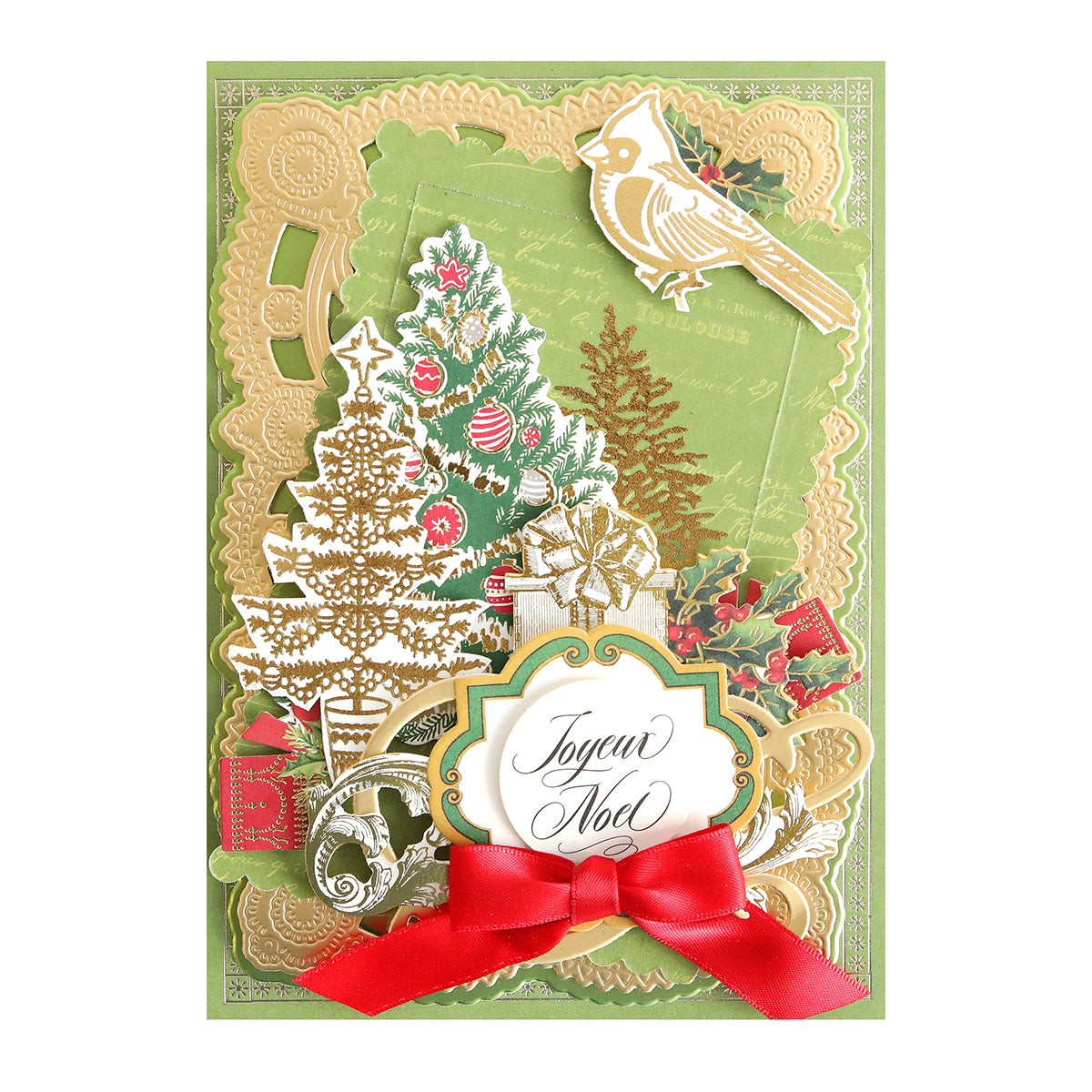 The Holiday Foil Rub On Transfers feature trees, a cardinal, ornaments, gold accents, a red bow, and "Joyeux Noël" in elegant script for a festive decorative Christmas card.
