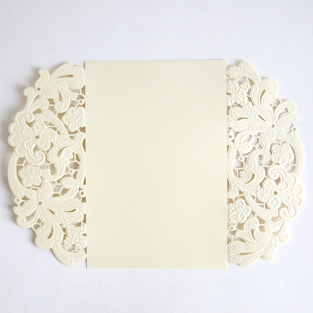 The Ivory Embossed Lace Gatefold 10 pack features blank cream cards with ornate, lace-like floral cutout borders on both sides—perfect for wedding or shimmer invitations—shown on a white background.