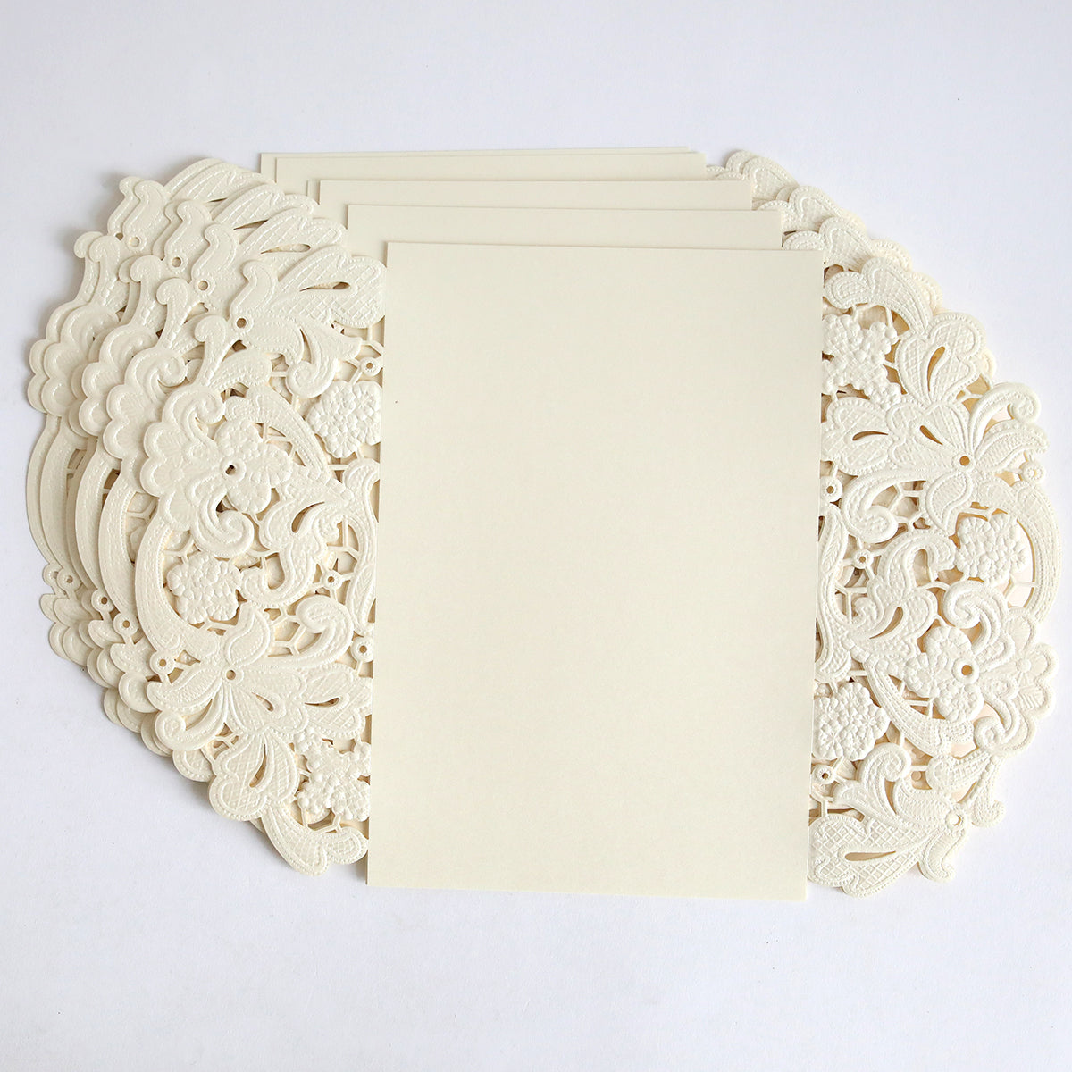 A 10 pack of Ivory Embossed Lace Gatefold invitations featuring intricate embossed lace and delicate floral borders, elegantly arranged on a white background.