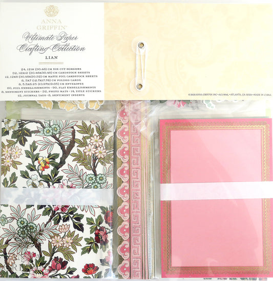 A crafting kit with floral and decorative patterned paper, premium-quality items, pink and gold card inserts, and a label reading "Lian Ultimate Papercrafting Collection.