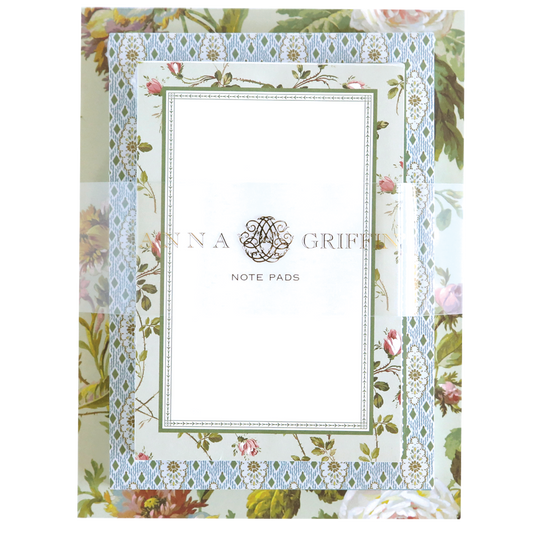 The Francesca Note Pad Set features a large floral pattern with "Anna Griffin" inscribed. The border has blue geometric designs mingled with blossoms and includes 300 sheets for notes and musings.
