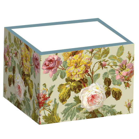 The Francesca Notepad Block features an elegant floral design of roses and leaves in pink, yellow, and green shades on a crisp white background.
