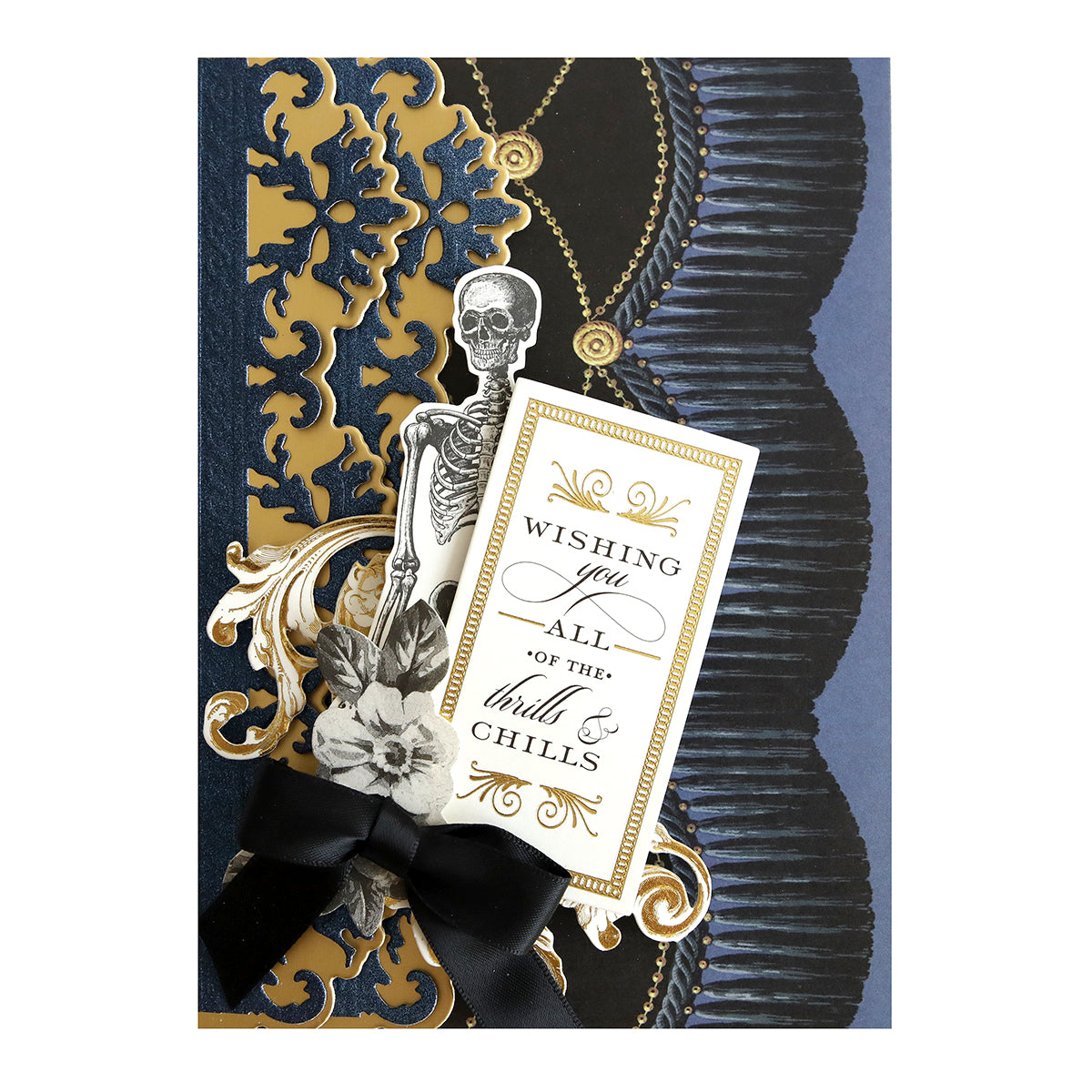A black and gold Anna Griffin Navy Metallic Cardstock adorned with a skeleton, perfect for card making and diecutting.